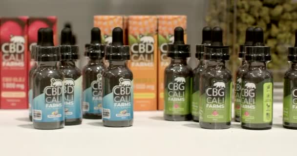 Capturing Attention Cbg Buyer Cbd Oil Bottles Closeup Organic Oils — Vídeo de Stock