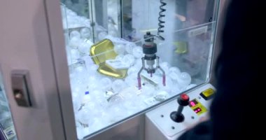 Event visitors buys cannabis by winning a vending machine. Interactive marketing tools to attract consumer attention, buyers at market. 5.11.2022 Beranovych 667, Prague, Czech Republic