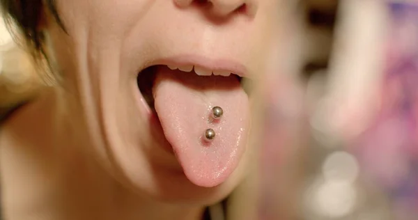 Woman Shows Tongue Piercing Camera Phone Smartphone Bokeh Two Earrings Stok Gambar Bebas Royalti