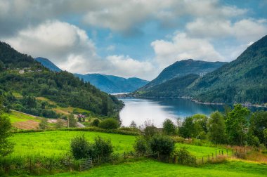 Beautiful Norwegian landscape in Haugsver (Hogsvaer). Vestland Fylke clipart