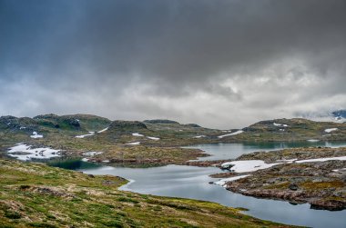 Üst vadiler. Lom, Norveç 'in Oppland iline bağlı bir belediyedir. Gudbrandsdal bölgesinin bir parçasıdır..