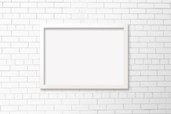 5x7 white horizontal frame with empty poster against a modern white brick background. Includes clipping path to make it easy to add your design to the frame.