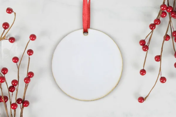 Festive Christmas Ornament Atop Classy Marble Background Surrounded Jolly Red — Stock Photo, Image