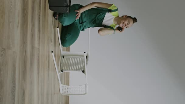 Female Assembling Chair High Quality Footage — Stockvideo