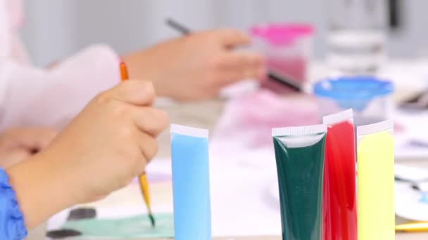 Tubes Colourful Paints Table Children Painting Background High Quality Footage — Wideo stockowe