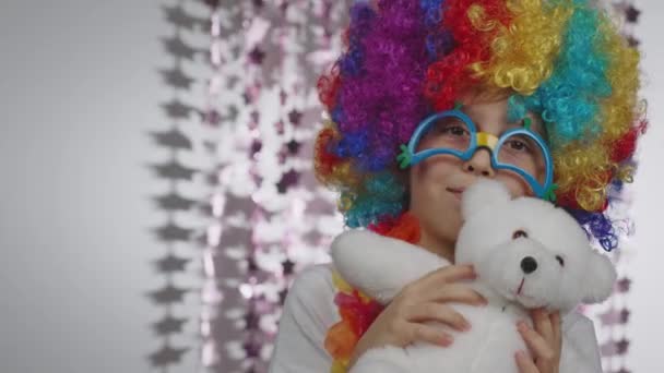 Boy Years Old Dressed Clowns Wig Eyeglasses Keeps Teddy Bear — Video Stock