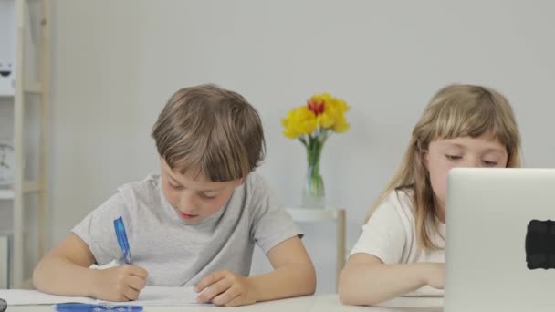 Boy Years Old Helps His Younger Sister Make Her Homework — Stockvideo