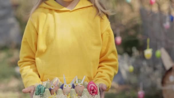 Girl Years Dressed Yellow Pullover Keeps Decorated Easter Eggs Palms — Stok video