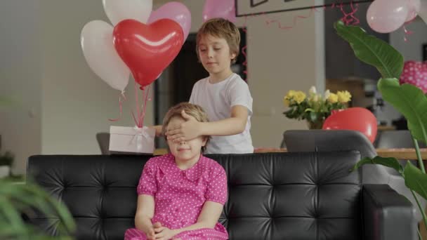 Boy Closes Eyes Girl Sitting Sofa High Quality Footage — Video