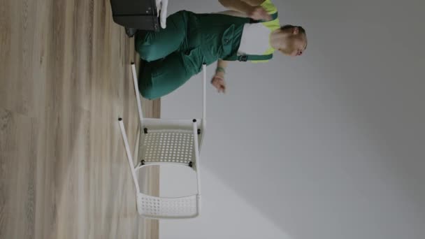 Female Assembling Chair High Quality Footage — Stockvideo