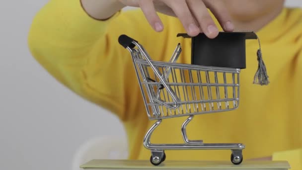 Boy Years Yellow Sweater Puts Academic Hat Shopping Cart High — Stock video