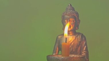 Buddha görüntülü mum tutucu. Yüksek kalite 4k görüntü