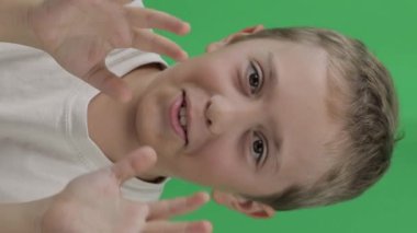 Boy of 9 years does not accept something. Closeup. High quality footage