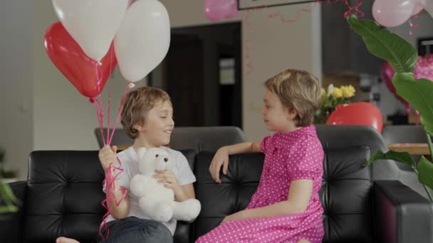 Boy Girl Sitting Sofa Decorated Room Valentines Day High Quality — Wideo stockowe