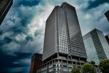 City sky and buildings. Shooting Location: Chiyoda ward, Tokyo clipart