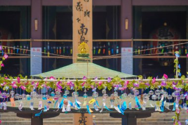 The bustle and flower decorations of the wind chime market. Shooting Location: Kawasaki City, Kanagawa Prefecture clipart