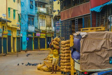 Sri Lankan market workers. Shooting Location: Sri Lanka, Colombo clipart