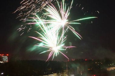 Fireworks celebrating New Year in Luxembourg. Dark night, long exposure