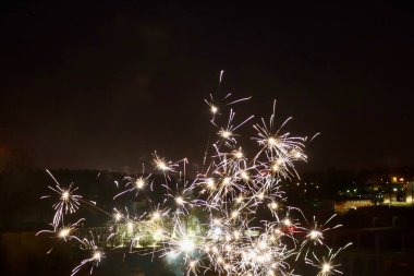 Fireworks celebrating New Year in Luxembourg, Luxembourg - January 1, 2023. Dark night, long exposure, copy space