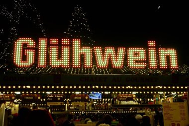 Mulled wine stall in Christmas market and Winter lights festival in Luxembourg, Luxembourg - December 27, 2022