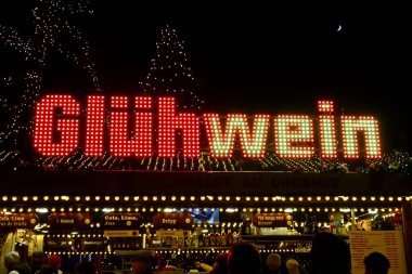 Mulled wine stall in Christmas market and Winter lights festival in Luxembourg, Luxembourg - December 27, 2022