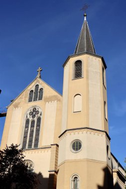 St Alphonse church facade with tower in Luxembourg old town. The 19th century building houses English speaking parish