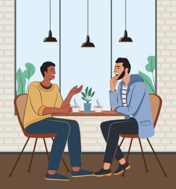 Bir kahve dükkanında samimi bir arkadaşlık anı ve kahkaha.