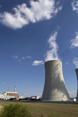 Cooling towers at nuclear power plant, energy self-sufficiency, greenhouse emission reduction and global warming concept, Dukovany, Czech Republic clipart