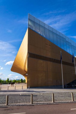 HELSINKI, FINLAND - JULY 7 2024: The Helsinki Central Library Oodi in the Kluuvi district on sunny summer day on July 7, 2024 in Helsinki, Finland. clipart