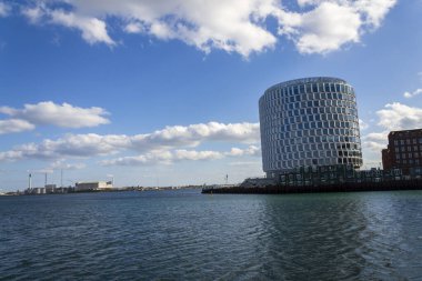 Nordhavn district with The Tip of Nordo office building on sunny day on April 29, 2023 in Copenhagen, Denmark. clipart