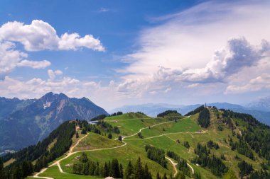 Cable car gondola on top of the Gernkogel Mountain from Sonntagskogel in Alps, Sankt Johann im Pongau district, Salzburg federal state, Austria, sunny summer day clipart