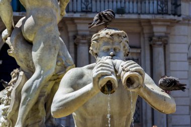 Fontana Del Moro at Piazza Navona in Rome, Italy, sunny day clipart