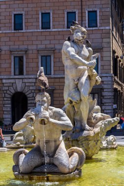 Fontana Del Moro at Piazza Navona in Rome, Italy, sunny day clipart