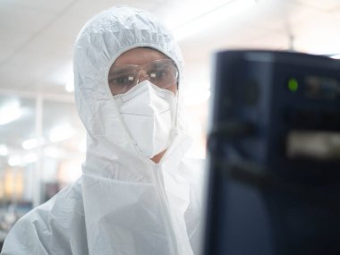  scientist doctor nurse staff person white uniform safety look at monitor computer electronic laboratory hospital clinic view wok job pharmaceutical medical skill education technology professional