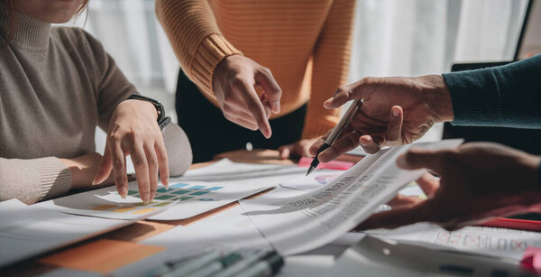 Team ux designer creative graphic planning application development a prototype smartphone layout...