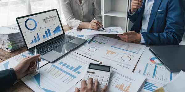 Stock image Business financial, accountant discussing with partner are meeting to audit finance planning sales to meet targets set in next year. stock market concept....