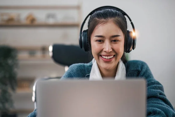 stock image Asian girl student online learning class study online video call zoom teacher, Happy asian girl learn english language online with computer laptop....