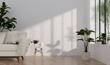 Parlak, minimalist oturma odası, beyaz bir kanepe, kapalı bitkiler, ve geniş pencereli doğal ışık..