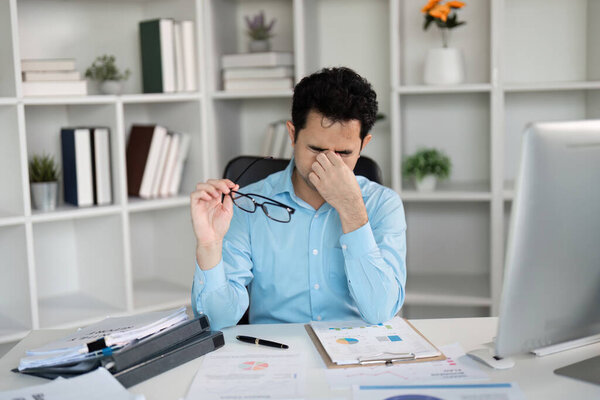 Explore the impact of office syndrome on workers and ways to improve wellbeing in a high-pressure environment.