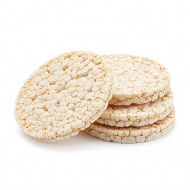 Beyaz arka planda izole edilmiş yuvarlak pirinç kekleri yığını. Atıştırmalık, yiyecek, sağlıklı, diyet, puf.