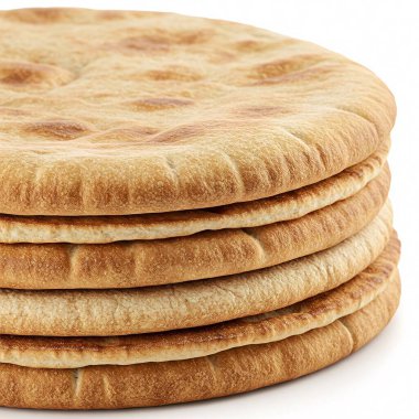 Açık kahverengi ile yuvarlak düz ekmekler yığını.