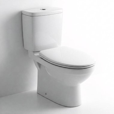 Beyaz seramik, kapalı kapaklı klozet, beyaz arka planda izole edilmiş..