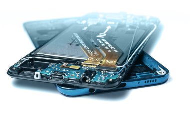 main case and back cover of disassembled blue smartphone isolated on white background close up