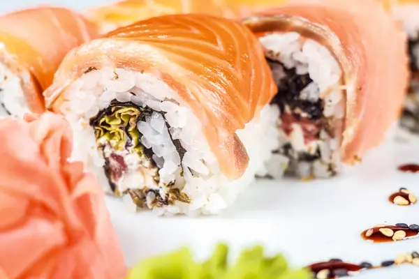 Fresh and flavorful Asian food, such as the California Roll with Salmon and Rice, awaits your taste buds!