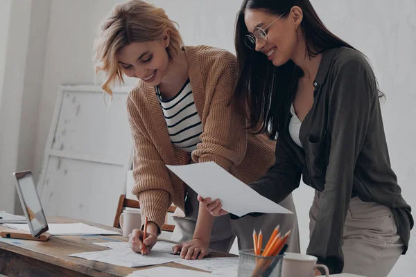 Two Happy Young Female Colleagues Working Papers Office Together — Stock Photo, Image