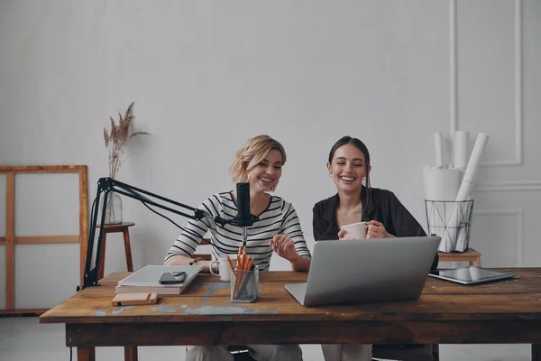 Two Confident Young Women Smiling While Providing Live Stream Studio — Stock Photo, Image