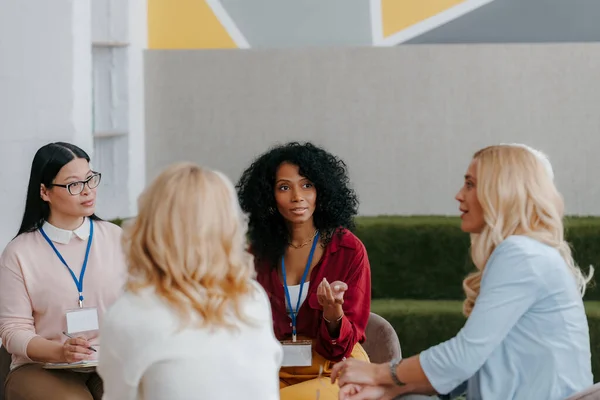 stock image Group of confident mature women communicating while visiting group training class