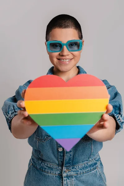 Happy Young Short Hair Woman Showing Heart Shaped Rainbow Flag — Stock Photo, Image