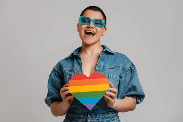 Happy Young Short Hair Woman Holding Heart Shaped Rainbow Flag — Stock Photo, Image