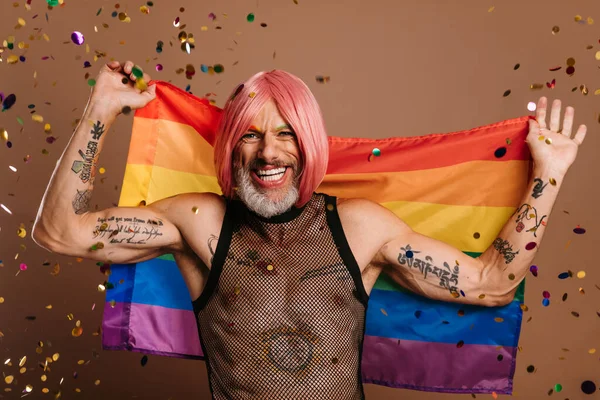 Joyful Gay Man Pink Wig Carrying Rainbow Flag While Confetti — Stock Photo, Image